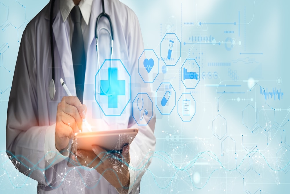 Doctor holds clipboard before an EKG, surrounded by futuristic medical icons